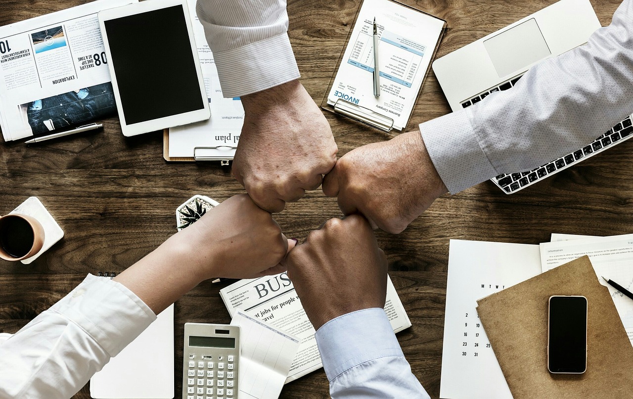 Results-driven digital marketing agency team analyzing campaign performance data to boost client growth and ROI.
